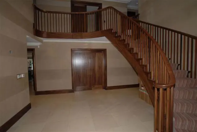 wooden curved staircase