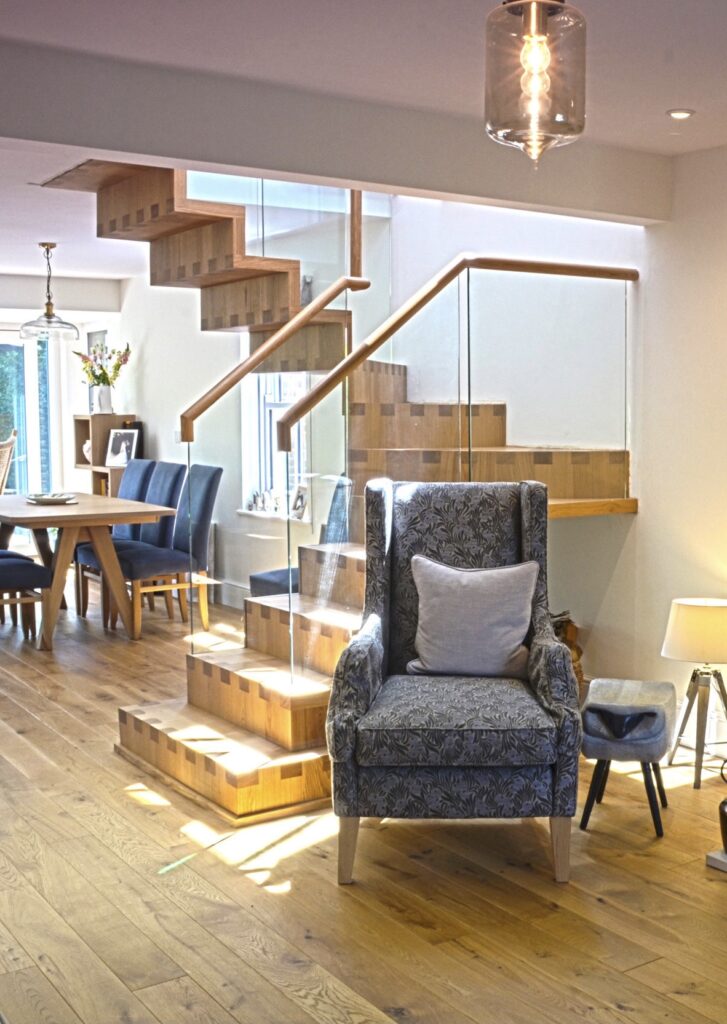 Oak dovetail stair with glass balustrade. contemporary spiral staircase