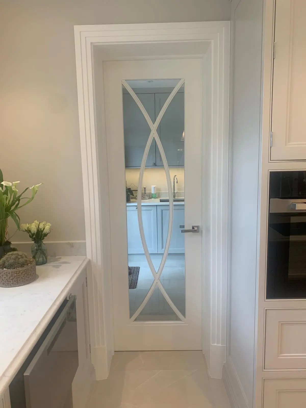 Internal glazed doors with curved glazing bars. internal sliding doors