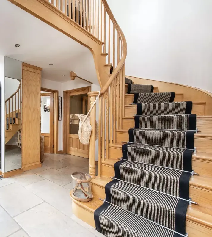 Oak cut string curved staircase