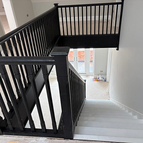 Ebonised closed string staircases, contemporary balustrade