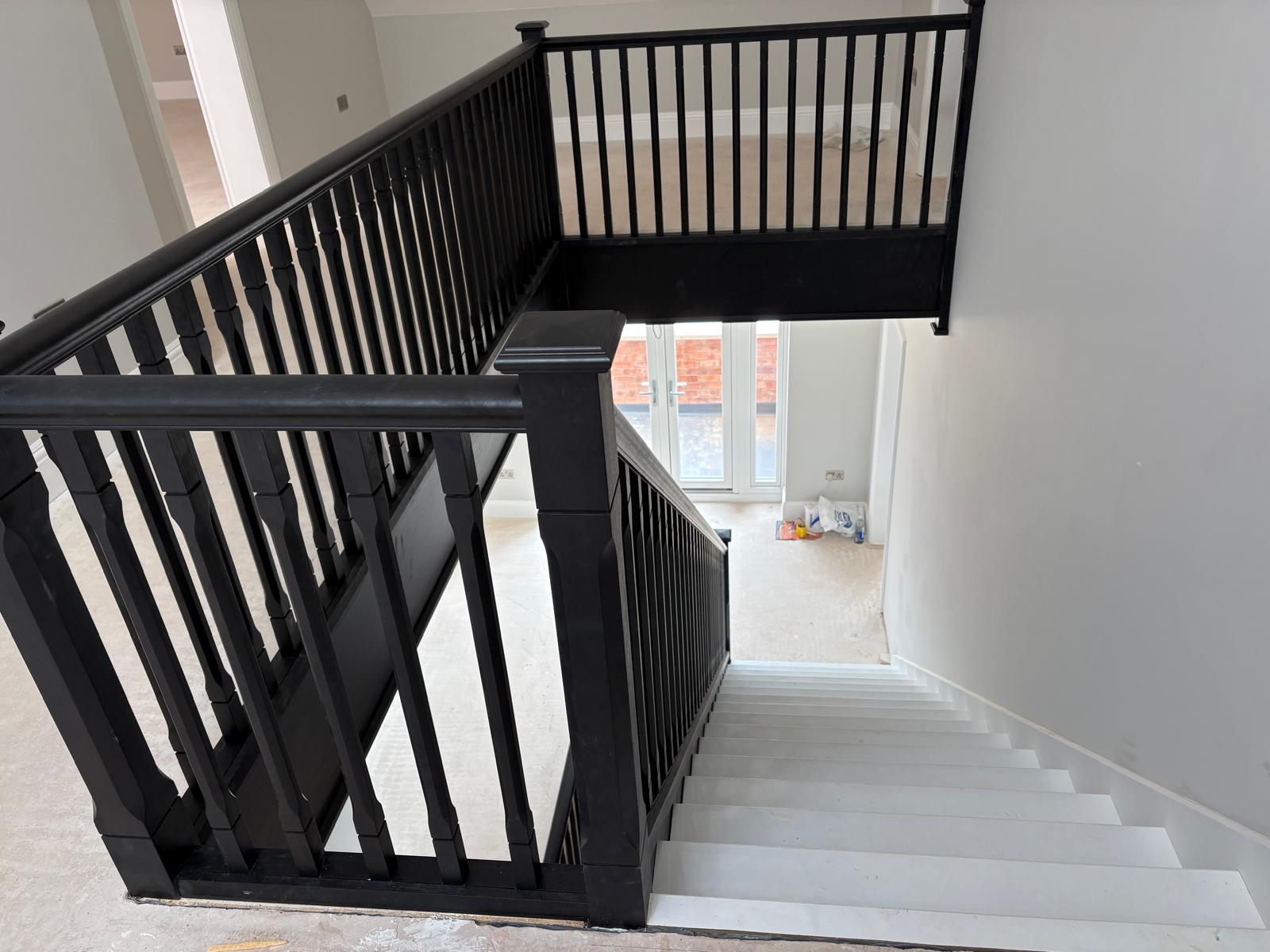 Ebonised closed string staircases, contemporary balustrade Ebonised closed string staircases, contemporary balustrade