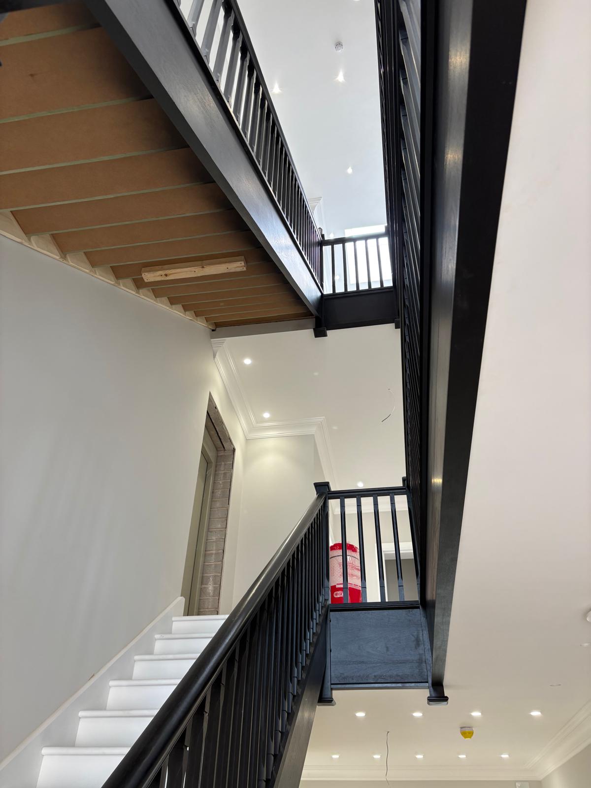 Ebonised closed string staircases, contemporary balustrade Ebonised closed string staircases, contemporary balustrade