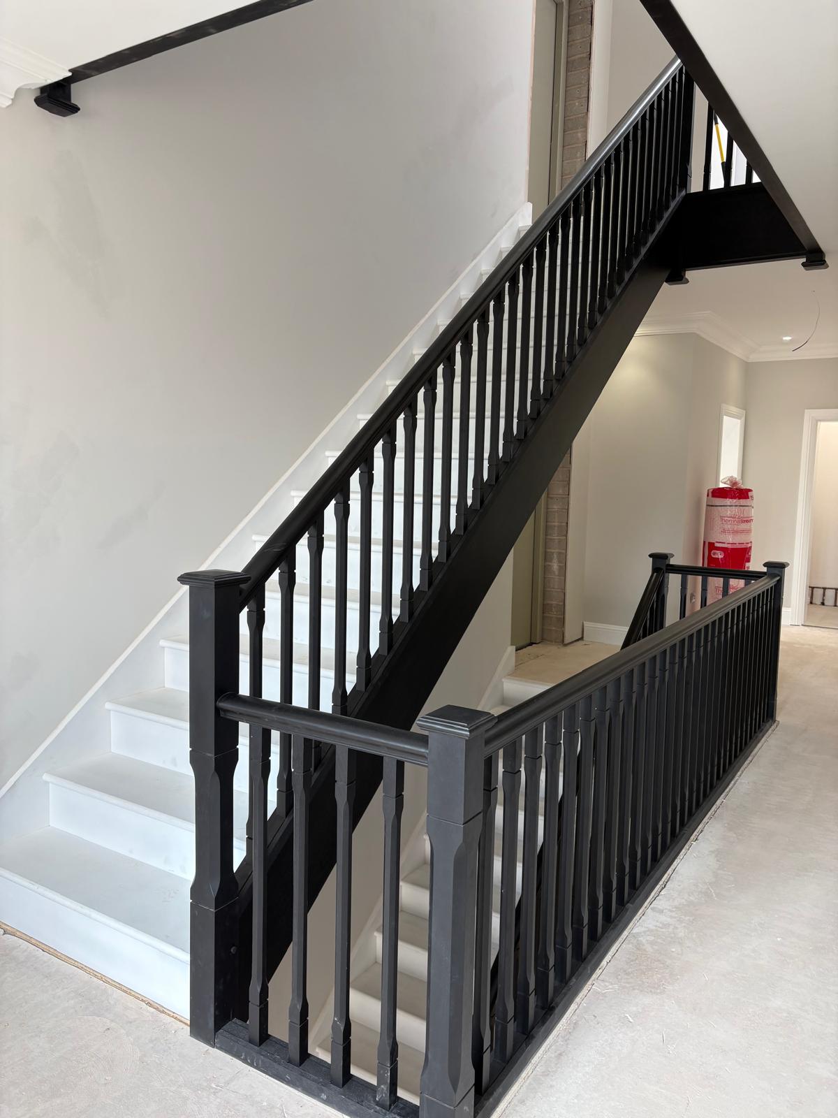 Ebonised closed string staircases, contemporary balustrade Ebonised closed string staircases, contemporary balustrade